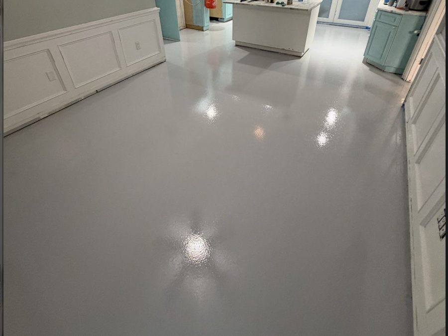 Solid grey epoxy floor in a home interior