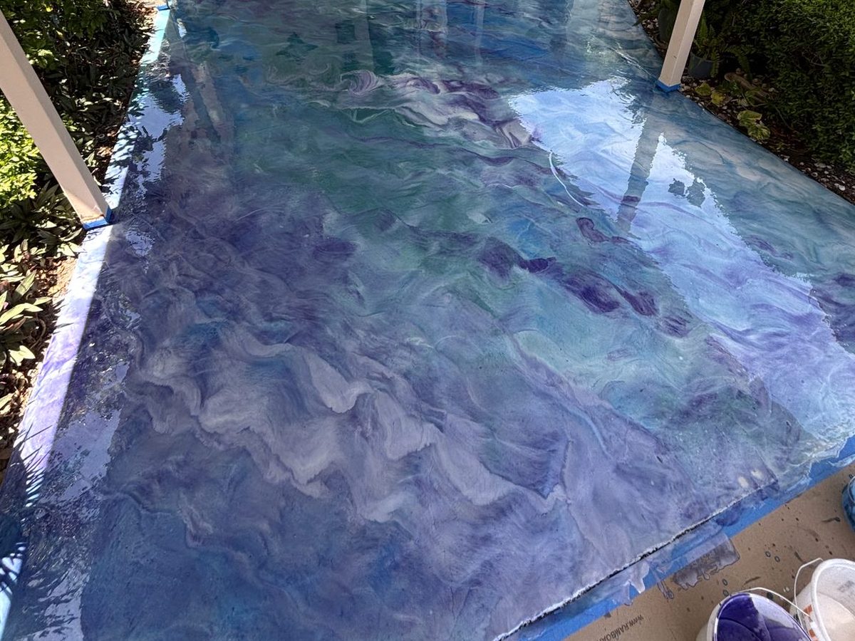 Blue and purple metallic epoxy lanai in St. Petersburg