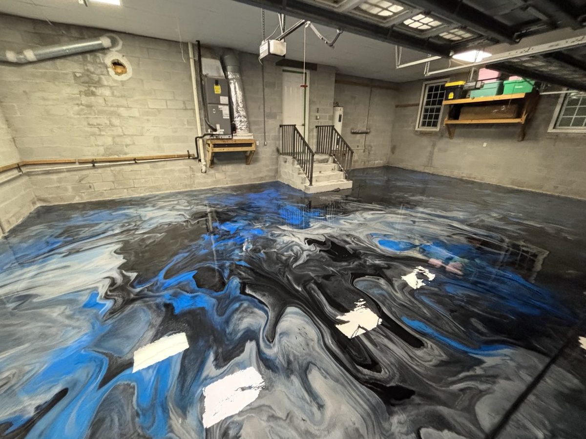Blue and black metallic epoxy garage floor in Tampa Bay